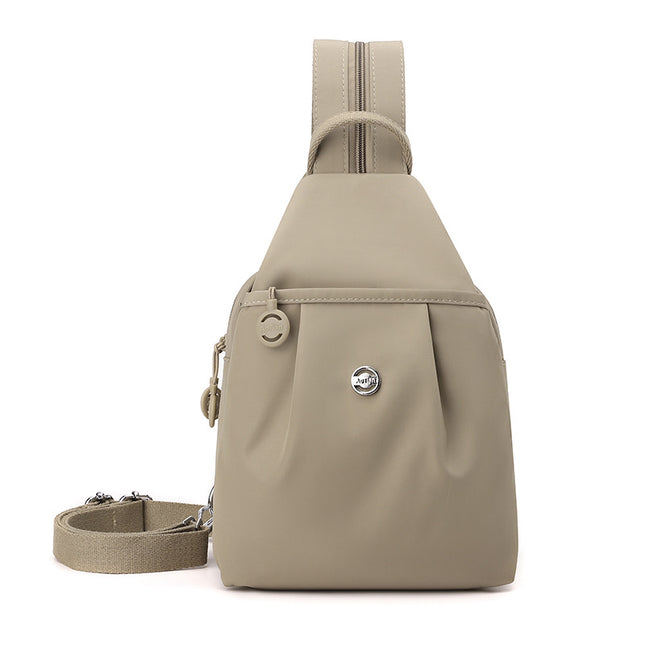 Beige Versatile Women's Convertible Mini Backpack & Sling Bag - Stylish Anti-Theft Oxford Cloth Daypack, Fits 9.7in iPad.