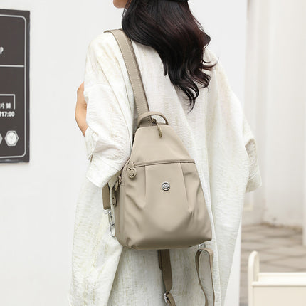 Beige Versatile Women's Convertible Mini Backpack & Sling Bag - Stylish Anti-Theft Oxford Cloth Daypack, Fits 9.7in iPad.