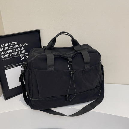 Black Large Capacity Travel Bag with Wet/Dry Separation - Canvas + Polyester, Lightweight Handbag for Short Trips and Fitness, Fits on Luggage.