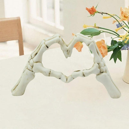 White Gothic Skeleton Hands Heart Sculpture - Macabre Love Figurine for Home & Halloween Decor.