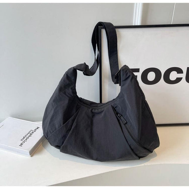 Black Lightweight Crescent Crossbody Bag - Slouchy Nylon Hobo Purse for Casual Everyday Use.