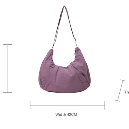 Pink Lightweight Crescent Crossbody Bag - Slouchy Nylon Hobo Purse for Casual Everyday Use.