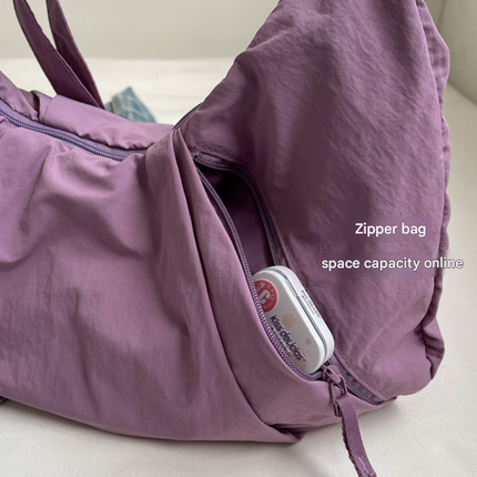 Pink Lightweight Crescent Crossbody Bag - Slouchy Nylon Hobo Purse for Casual Everyday Use.