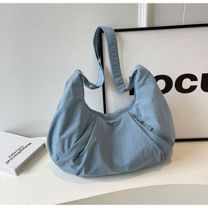 Blue Lightweight Crescent Crossbody Bag - Slouchy Nylon Hobo Purse for Casual Everyday Use.