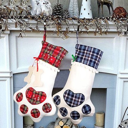 Red Large Plaid Dog Paw Christmas Stocking - Festive Fireplace Decor for Pet Lovers.