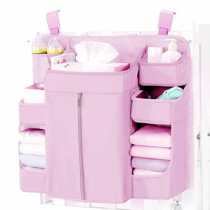 Pink Foldable Baby Crib Storage Hanging Bag - Large Capacity Organizer for Cribs and Changing Tables.
