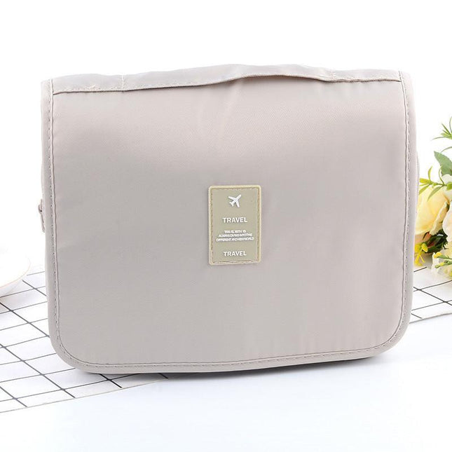 Beige Portable Hanging Travel Toiletry Bag - Large Capacity Cosmetic & Wash Organizer with Sturdy Hook.