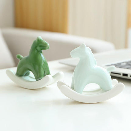 Light Green Modern Ceramic Rocking Horse Ornament - Cute Porcelain Figurine for Desk & Shelf Decor.