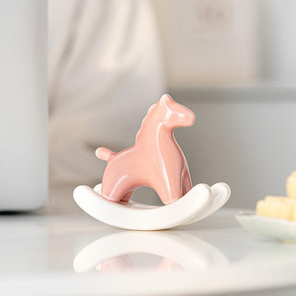 Pink Modern Ceramic Rocking Horse Ornament - Cute Porcelain Figurine for Desk & Shelf Decor.