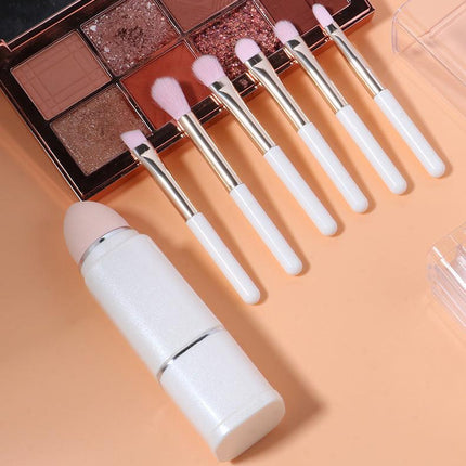 Wine Red Compact 8-in-1 Makeup Brush Set - Portable Travel Kit with Retractable Brushes and Case.