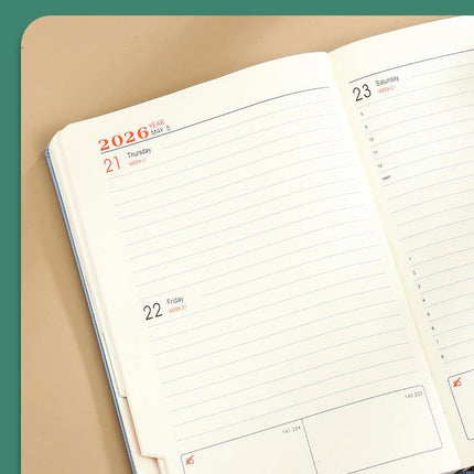 Green 2026 A5 English Daily Planner Notebook 365-Day Schedule Book for Monthly & Annual Planning.