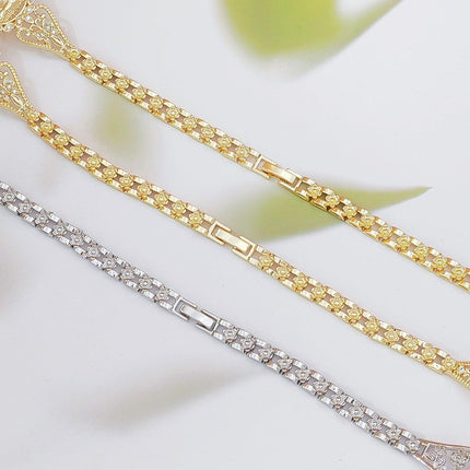 Elegant Hollow Floral Geometric Bracelet – Gold-Plated Copper Fashion Jewelry with Delicate Chain Design(R80）.