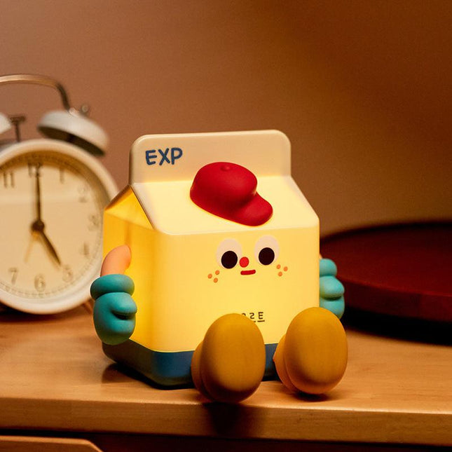 Adorable Milk Carton LED Night Light - USB Rechargeable Silicone Lamp with Tap Control, Timer & 3 Brightness Levels.