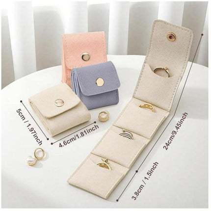 Pink Portable Mini Jewelry Pouch Soft Velvet Travel Organizer for Rings and Earrings Compact Snap Button Storage Bag Ideal for Daily Use.
