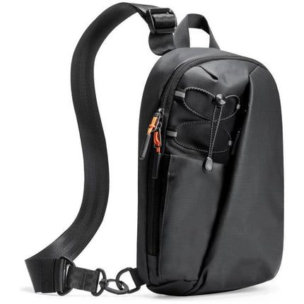 Black Modern Urban Sling Bag Crossbody Chest Pack with Quick Adjustable Strap Compact Daypack for Travel and Daily Commute.