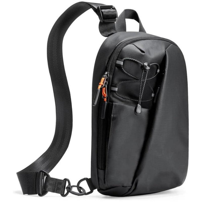 Black Modern Urban Sling Bag Crossbody Chest Pack with Quick Adjustable Strap Compact Daypack for Travel and Daily Commute.