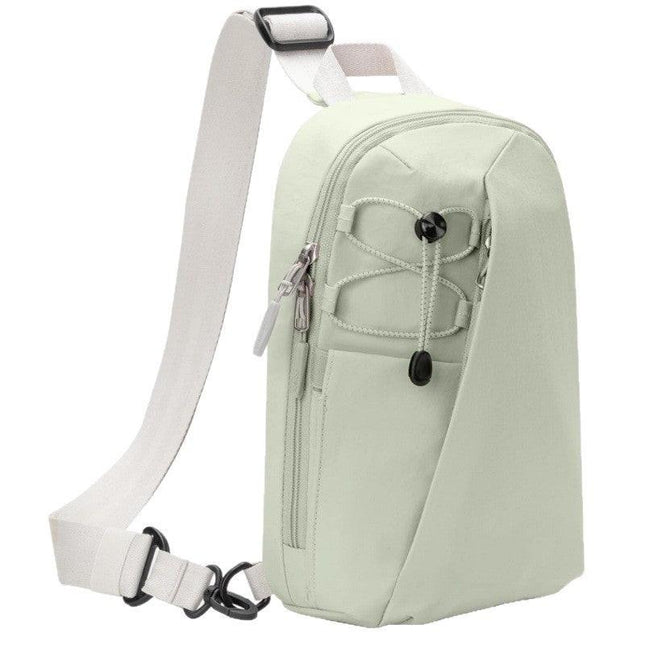 Green Modern Urban Sling Bag Crossbody Chest Pack with Quick Adjustable Strap Compact Daypack for Travel and Daily Commute.