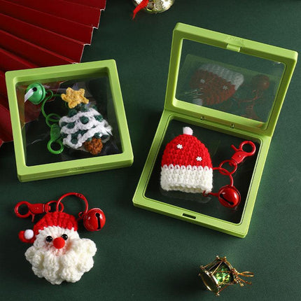 Handmade Christmas Crochet Keychain Knitted Yarn Keyring with Floating Display Case Festive Bag Charm Ideal for Kris Kringle and Stocking Stuffers.