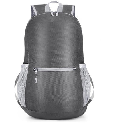 Grey Ultra Lightweight Foldable Backpack Packable Daypack Compact Travel Rucksack with Mesh Pockets Ideal for Outdoor Adventures.