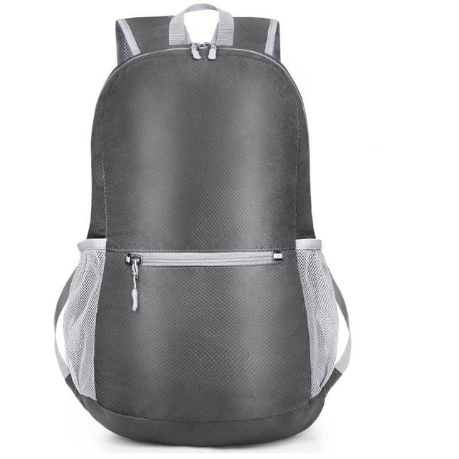 Grey Ultra Lightweight Foldable Backpack Packable Daypack Compact Travel Rucksack with Mesh Pockets Ideal for Outdoor Adventures.
