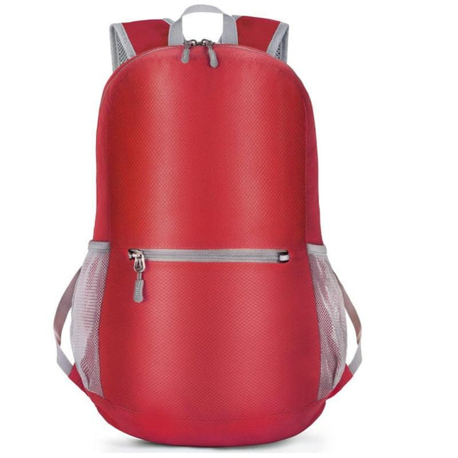 Red Ultra Lightweight Foldable Backpack Packable Daypack Compact Travel Rucksack with Mesh Pockets Ideal for Outdoor Adventures.