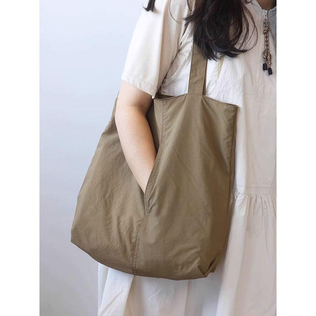 Light Brown Women's Minimalist Nylon Tote Bag Ultra Lightweight Shoulder Shopper Large Capacity Fits A4 Documents for Work and School.