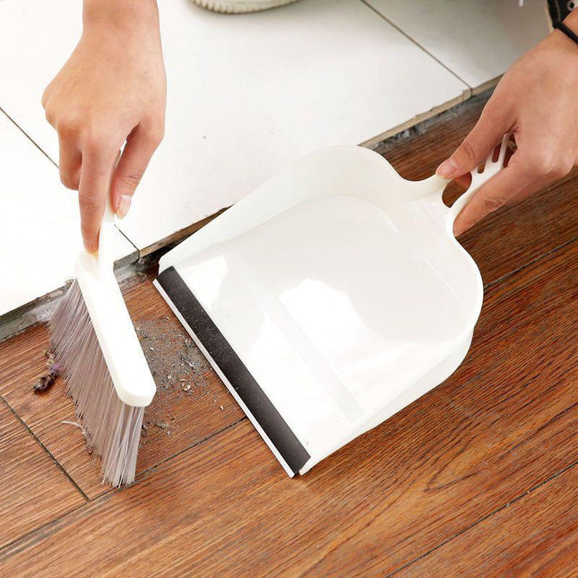 Beige Mini Dustpan and Brush Set Handheld Sweeping Broom with Rubber Lip for Desktop Kitchen Car and Camping Cleaning.