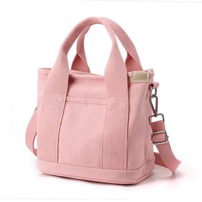 Pink Small Canvas Tote Bag Crossbody Lunch Handbag with Adjustable Strap Fits 9.7 Inch Tablet for Women Daily Work and Travel.