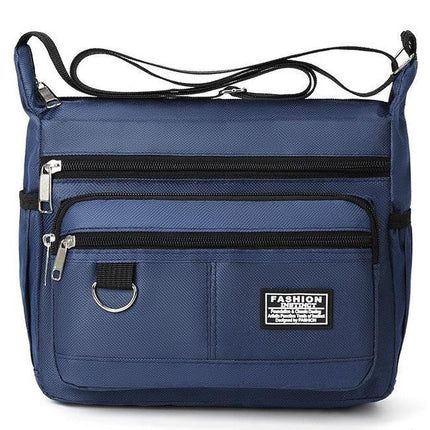 Dark Blue Men's Waterproof Oxford Cloth Crossbody Bag - Durable Anti-Theft Shoulder Backpack for Business, Travel & 10-inch Tablet.