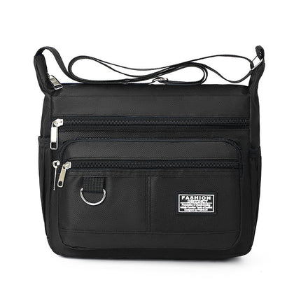 Black Men's Waterproof Oxford Cloth Crossbody Bag - Durable Anti-Theft Shoulder Backpack for Business, Travel & 10-inch Tablet.