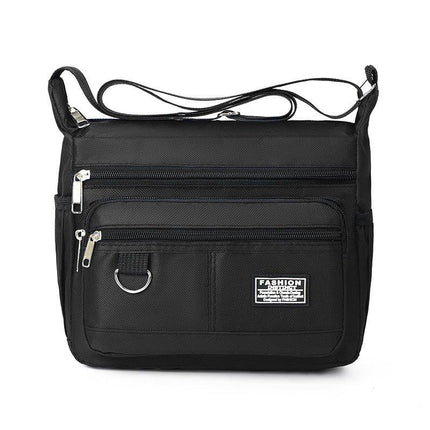 Black Men's Waterproof Oxford Cloth Crossbody Bag - Durable Anti-Theft Shoulder Backpack for Business, Travel & 10-inch Tablet.