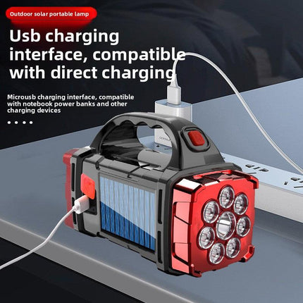 Gold Solar Powered LED Camping Lantern and Flashlight Rechargeable Portable Searchlight with Side Light and USB Power Bank for Outdoor Emergency.