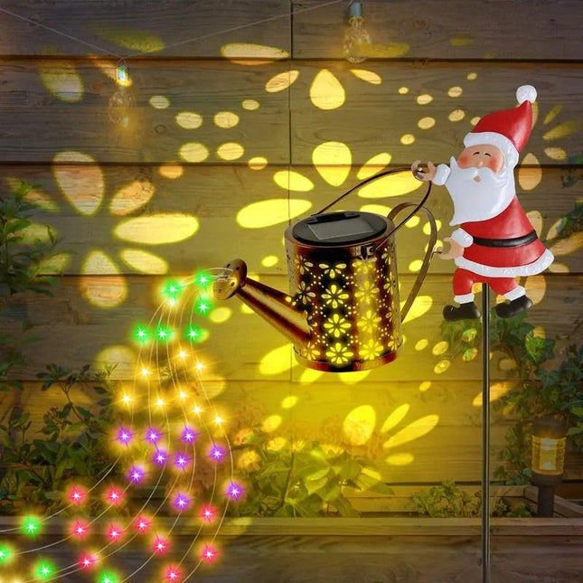 Colorful lights Solar Powered Santa Claus Garden Stake Light with Metal Watering Can - Colourful LED Waterfall Effect - Outdoor Christmas Decoration for Yards and Pathways - 82cm Height.