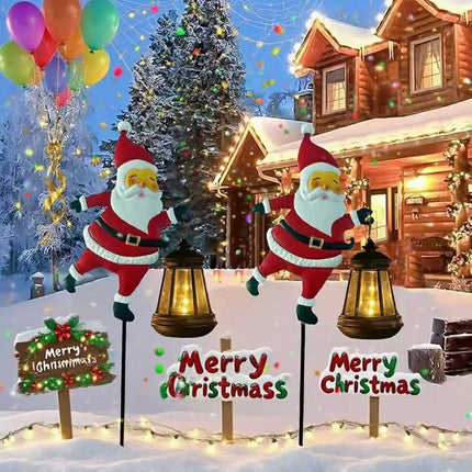 Warm white light Solar Powered Christmas Garden Stake - Metal Santa Claus with Glowing Lantern - Warm White LED Outdoor Decoration - 82cm Height.