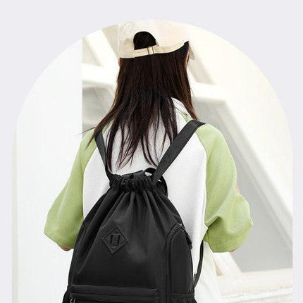 Large Drawstring Backpack Waterproof Gym Bag Lightweight Sports Sackpack with Zipper Pockets for Travel and Swimming Purple.