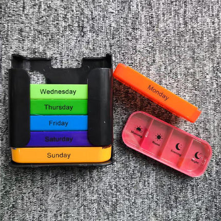 7 Day Weekly Pill Organiser Box - Rainbow Colour Coded Medicine Storage with 4 Daily Compartments - Portable Black Casing Dispenser for Home & Travel.
