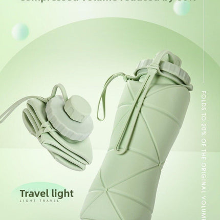 Green Portable Food Grade Silicone Collapsible Sports Water Bottle 600ML - Folding down 80% , Low High Temperature Resistant.