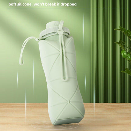 Blue Portable Food Grade Silicone Collapsible Sports Water Bottle 600ML - Folding down 80% , Low High Temperature Resistant.