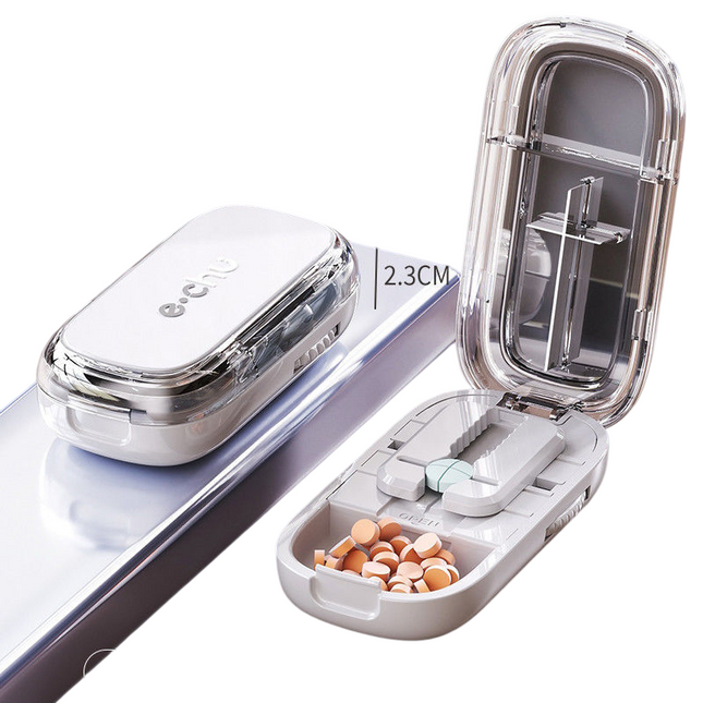 Grey Portable Mini Pill Organizer with 1/2 & 1/4 Precision Cutter - 3-Compartment Daily Travel Medicine Case with Rolling Knob Lock.