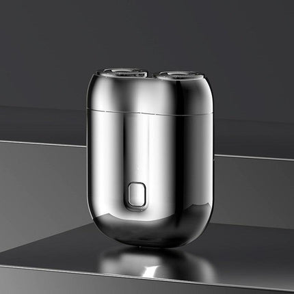 Silver Portable Mini Electric Shaver with Dual Floating Heads IPX6 Waterproof Rechargeable Travel Razor for Men for Grooming and Business Trips.