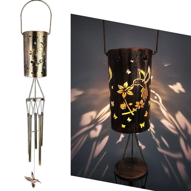 Hummingbird Solar Wind Chime Lantern with Iron Art Projection Waterproof Decorative Light for Garden and Local Home Landscapes Elegant Outdoor Illumination Solution.