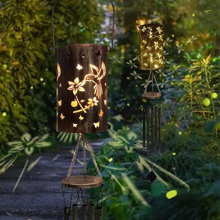 Hummingbird Solar Wind Chime Lantern with Iron Art Projection Waterproof Decorative Light for Garden and Local Home Landscapes Elegant Outdoor Illumination Solution.