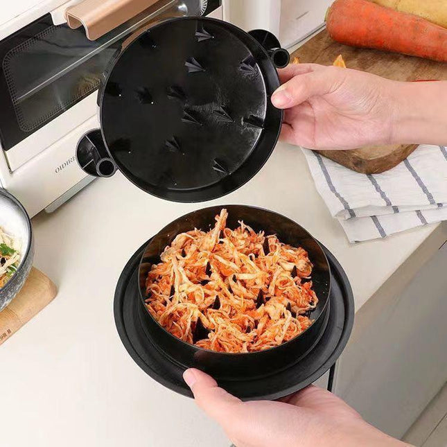 Black Manual Meat Shredder with Spiked Interior for Quick Chicken Separation Professional Rotating Tool for Local Home Kitchens Effortless Meal Prep Solution.