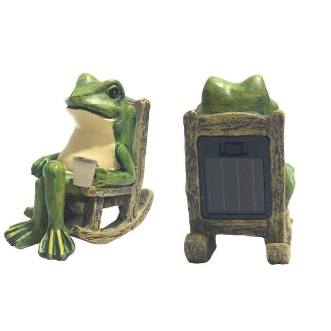 Solar Powered Rocking Chair Frog Garden Statue Resin Animal Sculpture with LED Glowing Cup for Patio Backyard Landscape Charming Decor for Local Homes.