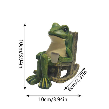 Solar Powered Rocking Chair Frog Garden Statue Resin Animal Sculpture with LED Glowing Cup for Patio Backyard Landscape Charming Decor for Local Homes.