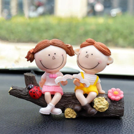 Couple reading under a tree Cute Couple Car Ornament for Dashboard – Romantic Interior Decoration for Vehicles.