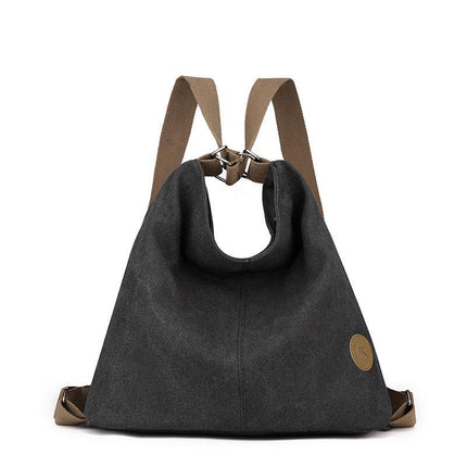 Black Versatile 3-in-1 Canvas Backpack and Shoulder Bag Large Capacity Handbag for Women Ideal for Travel School and Everyday Use.