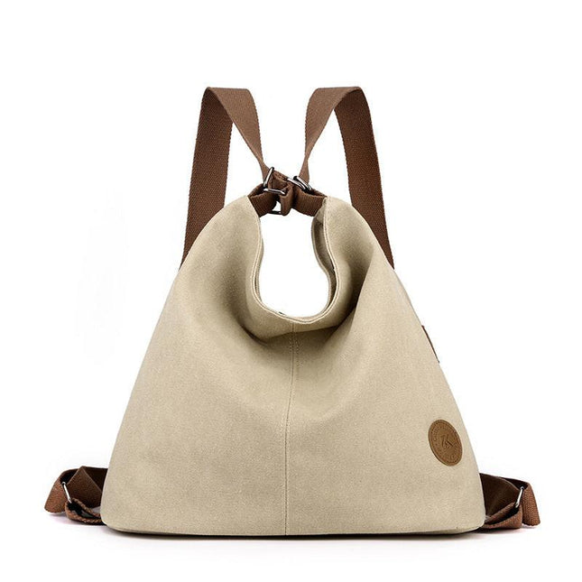 Khaki Versatile 3-in-1 Canvas Backpack and Shoulder Bag Large Capacity Handbag for Women Ideal for Travel School and Everyday Use.