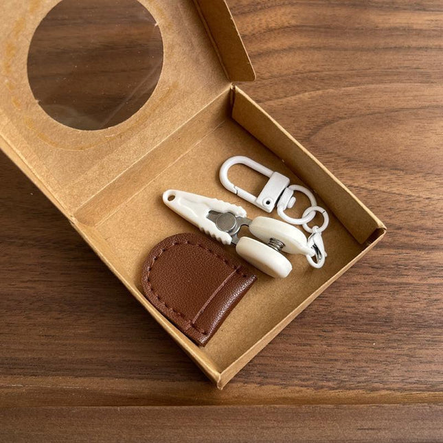 Coffee Ultra-Portable Mini Precision Scissors Set - Compact 7cm Craft Snips with Safety Cap, Leather Sheath, and Keychain Hook for Travel and DIY.