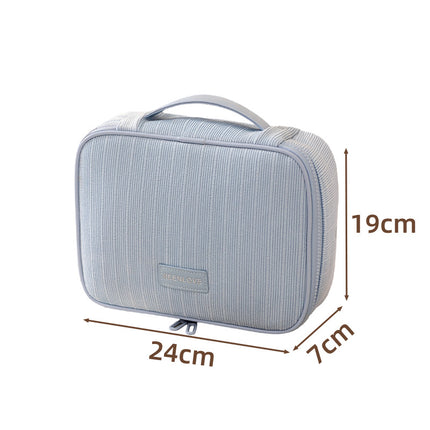 Blue Professional Large Capacity Travel Makeup Bag - Multifunctional Cosmetic Organizer with Dedicated Brush Slots and Portable Handle.